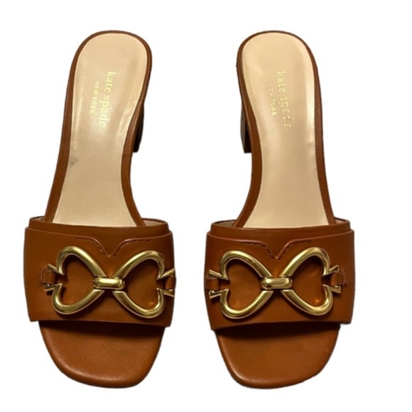 kate spade Shoes - Kate Spade Tan Mules with Gold Bow Accent Heels